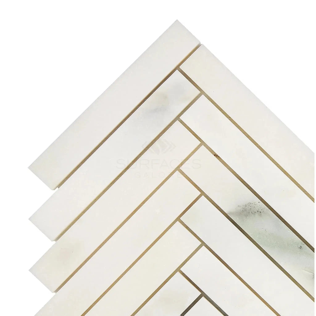 White herringbone tile pattern in Calacatta Oliva Marble 1X6 Mosaic Tile
