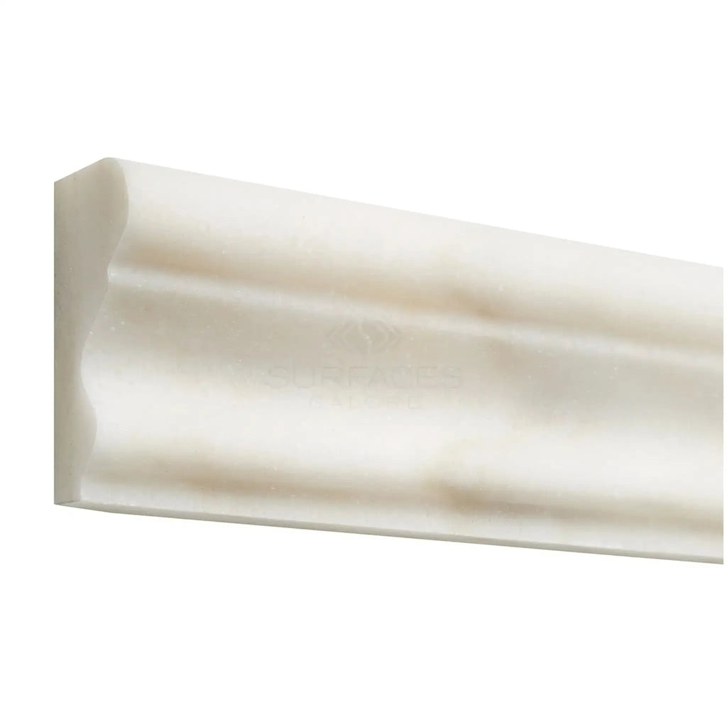 Creamy white decorative molding from Calacatta Oliva Marble 2X12 Milano Trim polished finish