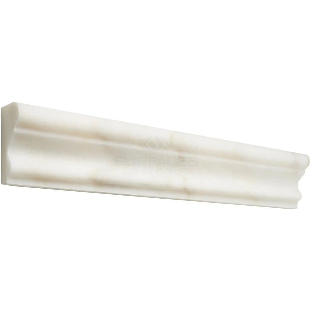White decorative molding in Calacatta Oliva Marble Milano Trim polished finish