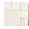 White square mosaic tiles displayed in Calacatta Oliva Marble Rimini Border