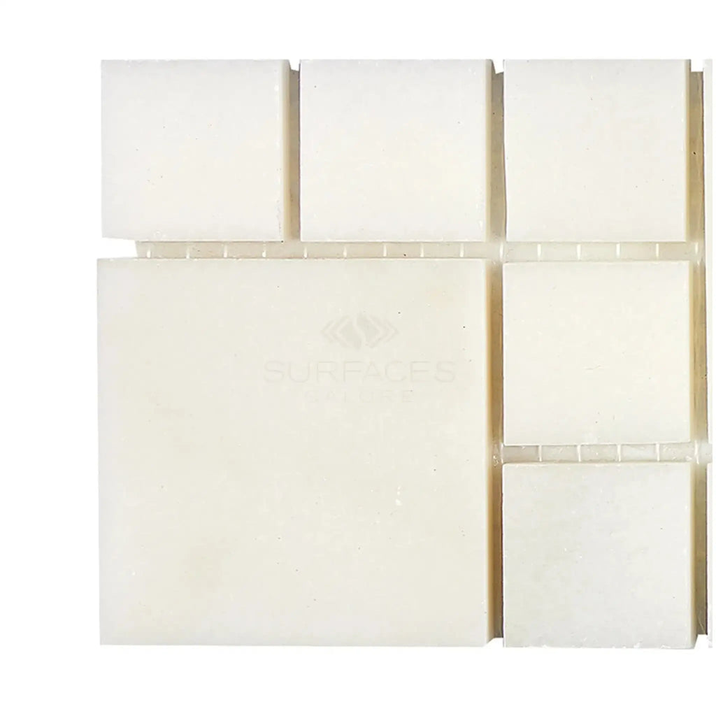 White square mosaic tiles displayed in Calacatta Oliva Marble Rimini Border