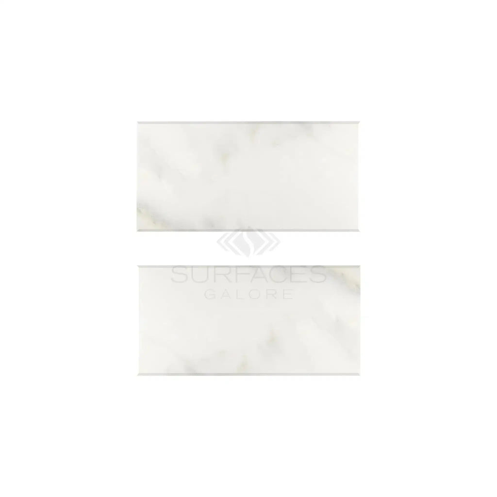 Two Calacatta Oliva Marble 3X6 Deep-Beveled Polished-Honed tiles in white