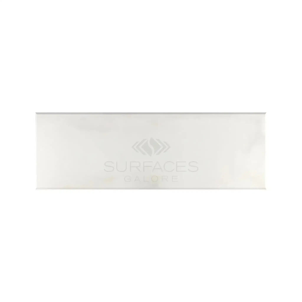Rectangular white box showcasing Calacatta Oliva Marble 4X12 Deep-Beveled Tile Polished-Honed