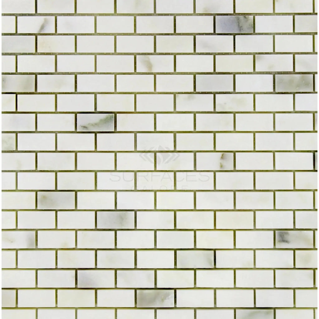 Calacatta Oliva Marble 5/8X1 1/4 Brick Mosaic Tile in White Marble Display