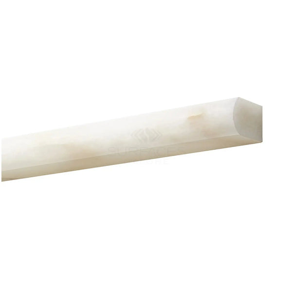 Polished white onyx pencil tile featured in Calacatta Oliva Marble molding