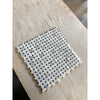 Woven white and gray marble tile from Calacatta Oliva Marble Basketweave collection