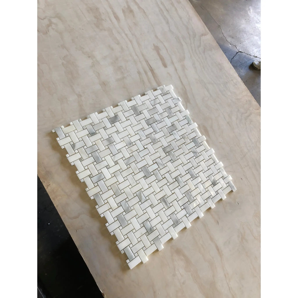 Woven pattern of white and gray Calacatta Oliva marble tiles for elegant flooring or backsplash