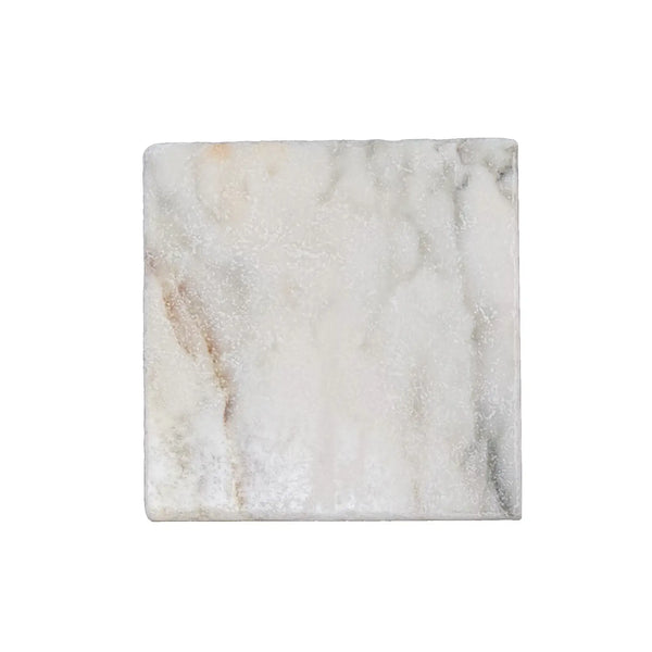 A square white calacatta verde royale marble 12x12 tile with subtle gray and beige veining and a tumbled finish