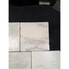 Square white calacatta verde royale marble 12x12 tile with subtle gray veining and tumbled finish