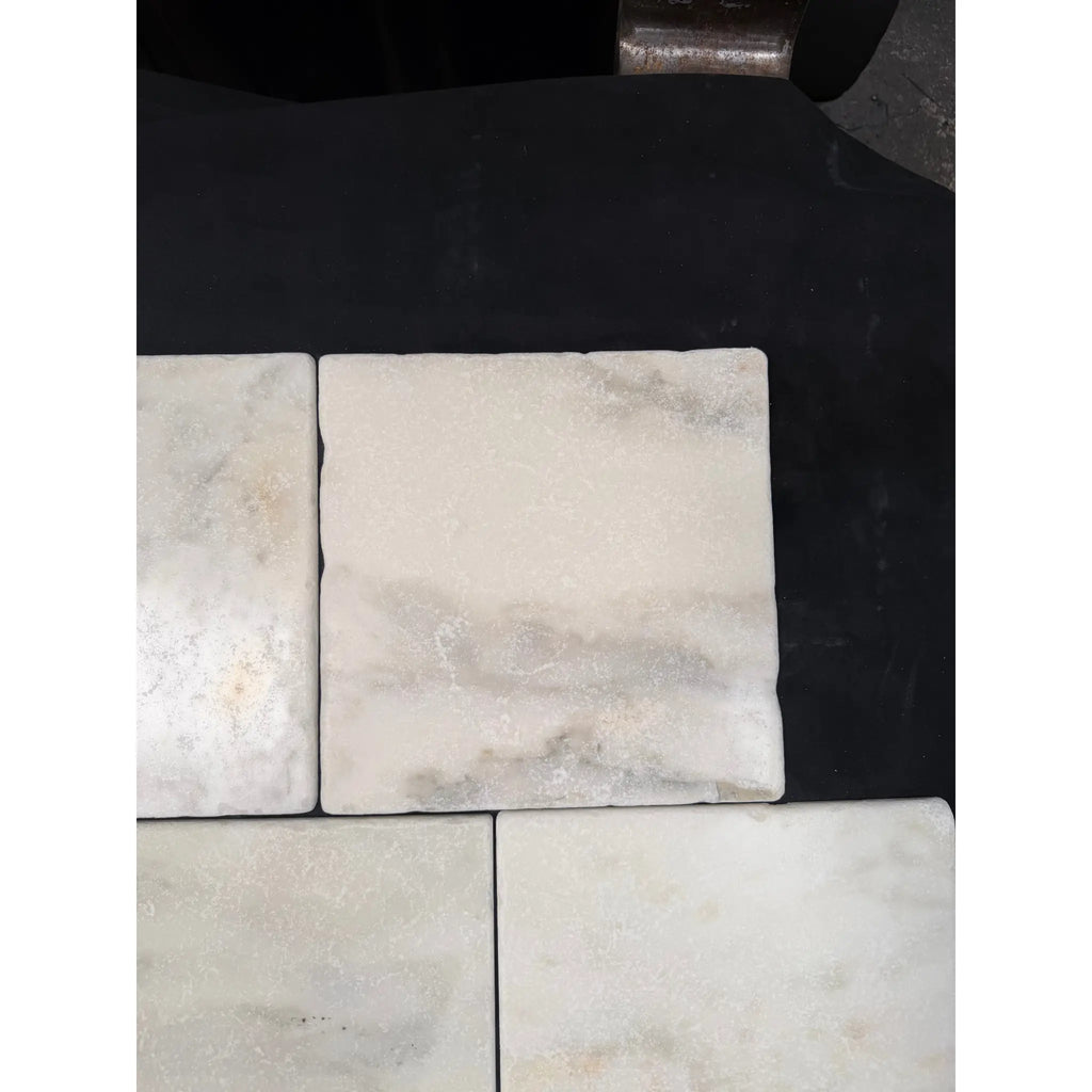 Square white calacatta verde royale marble 12x12 tile with subtle gray veining and tumbled finish