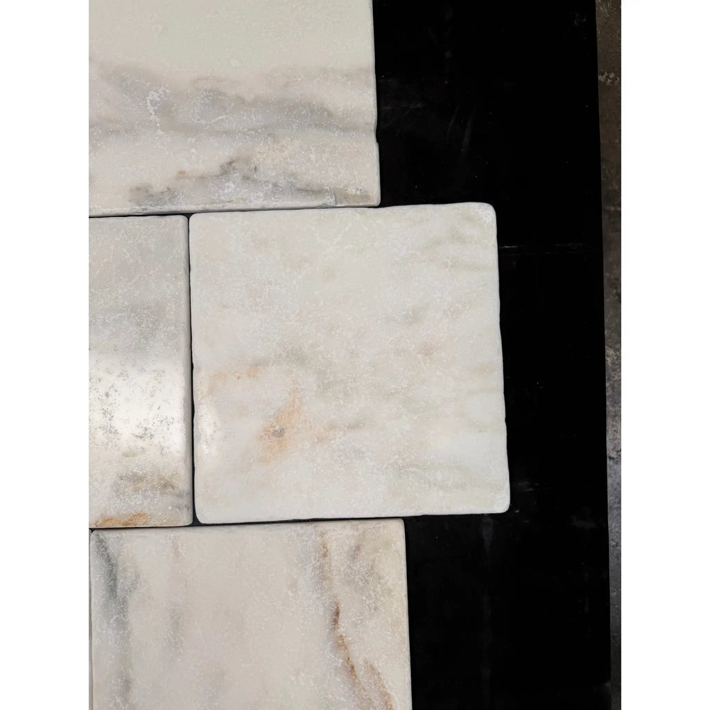 White marble calacatta verde royale 12x12 tumbled tile with subtle gray and beige veining for flooring and walls