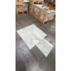 White marble-patterned ceramic tiles from Calacatta Oliva Marble 12X24 collection