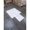 White marble tiles with gray veining from Calacatta Oliva Marble 18X18 collection