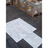 White marble-look tiles with gray veining from Calacatta Oliva Marble 18X18 Tile collection