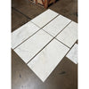 Polished Calacatta Oliva marble tile with white base and gray veining, 18x36 size