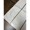 Calacatta Oliva Marble 18x36 Polished Tile with Black Grout