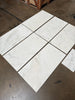 Polished Calacatta Oliva marble tile with white base and gray veining, 18x36 size
