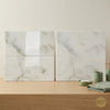 White marble-effect Calacatta Verde Royale 18x36 polished or honed tile with subtle gray veining in a modern bathroom setting