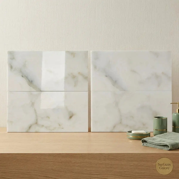 White marble-effect Calacatta Verde Royale 18x36 polished or honed tile with subtle gray veining in a modern bathroom setting