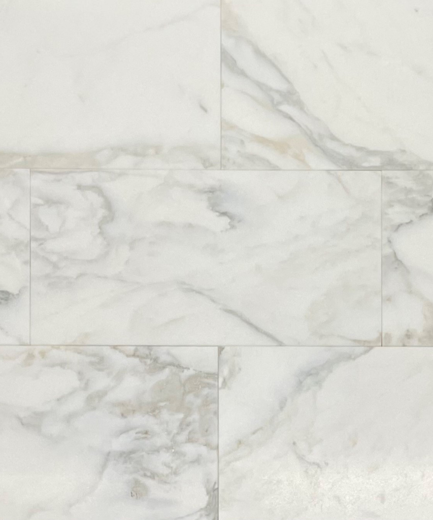 White Calacatta Oliva Marble mosaic wall tile with grey veining for elegant interiors