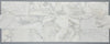 Calacatta Oliva Marble 18x36 tile with white marble subway style backsplash and grey veining