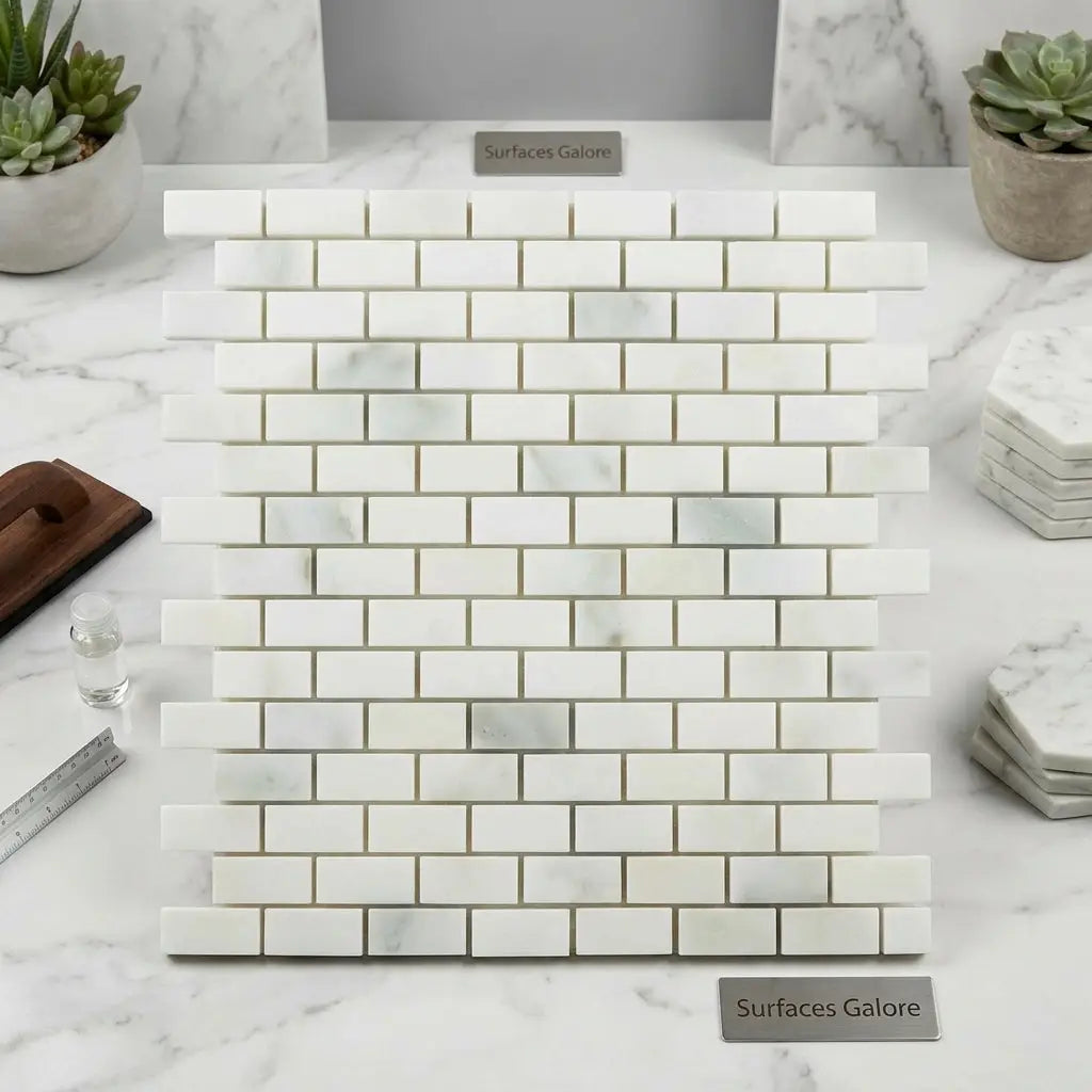 Calacatta verde royale marble 1x2 brick mosaic tile polished with white marble subway tiles and subtle gray veining