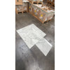 White marble-patterned ceramic floor tiles from Calacatta Oliva Marble 24X24 collection