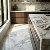 Calacatta verde royale marble 24x24 tile with polished white marble and elegant gray veining with gold-toned handles