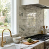 White marble subway tile backsplash with gray veining calacatta verde royale marble 2x4 brick deep-beveled mosaic tile polished-honed