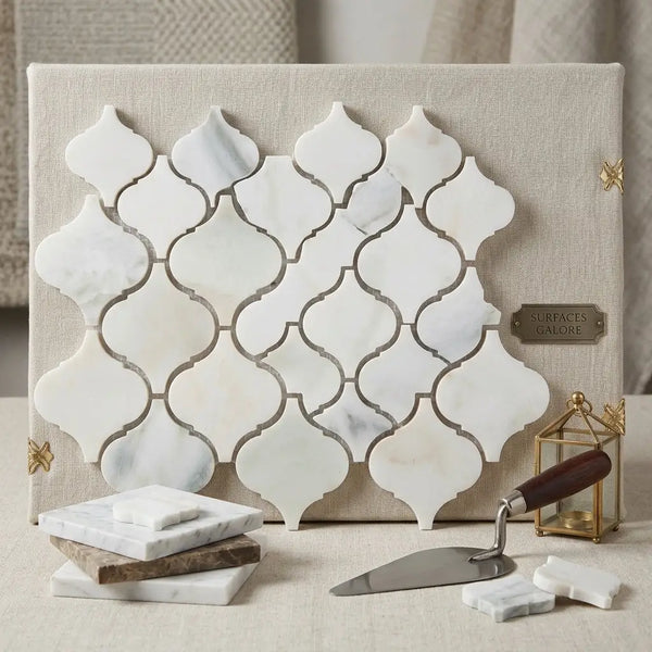 White marble quatrefoil mosaic tiles in calacatta verde royale marble with polished or honed arabesque design