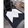 Calacatta verde royale marble 3x12 chevron mosaic polished-honed white marble tiles arranged in a herringbone pattern