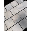 Calacatta verde royale marble 4x4 tile tumbled light gray stone with natural texture subtle veining and irregular edges