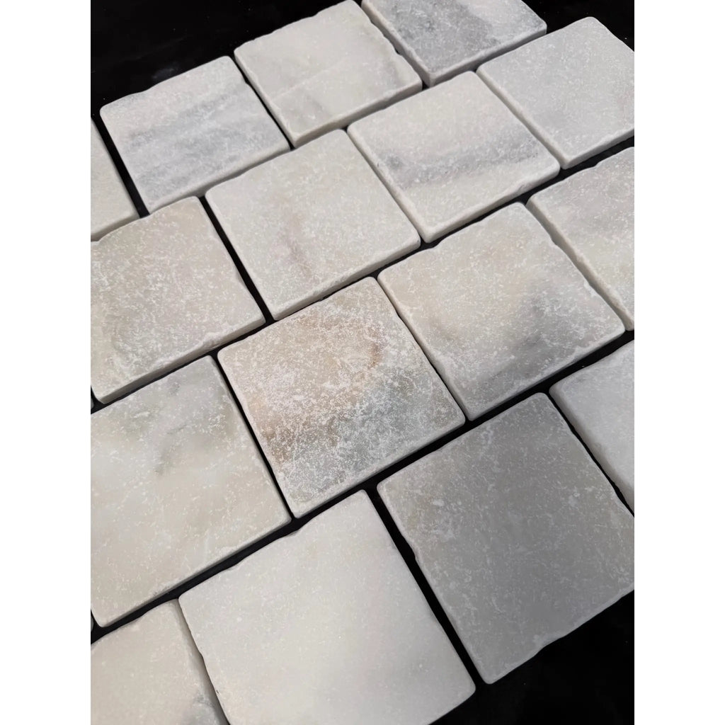 Calacatta verde royale marble 4x4 tile tumbled square light gray stone mosaic with subtle veining and textured surface