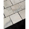 Calacatta verde royale marble 4x4 tile tumbled in light gray with natural texture and subtle veining on square stone tiles