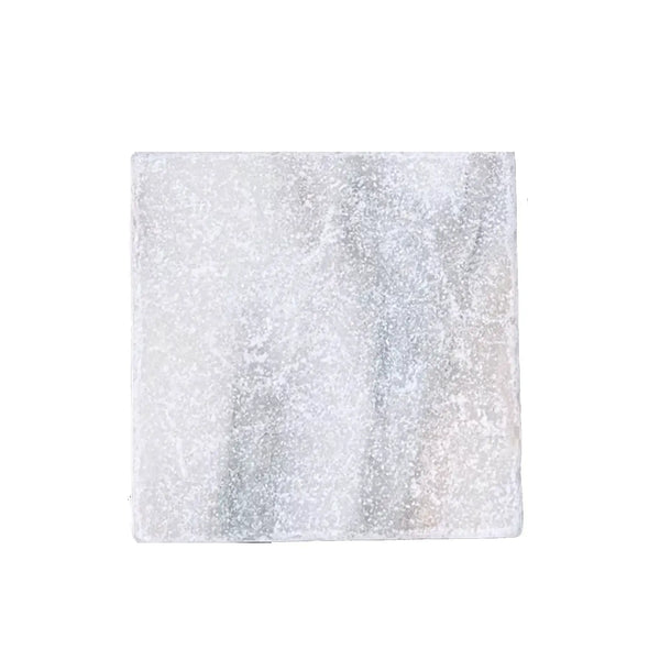 A square translucent glass tile with frosted white and gray marbled pattern calacatta verde royale marble 4x4 tile tumbled