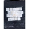 Calacatta verde royale marble 4x4 tile tumbled featuring white marble mosaic tiles with subtle gray veining in a grid pattern