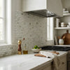 White marble subway tile backsplash with subtle gray veining calacatta verde royale polished or honed brick mosaic