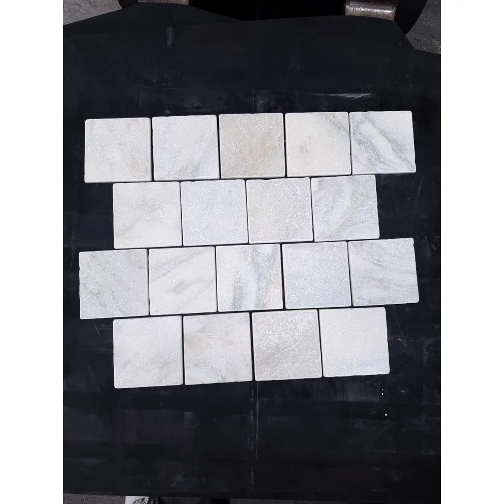 Calacatta verde royale marble 6x6 tile tumbled displaying white marble mosaic tiles with subtle gray veining in staggered pattern