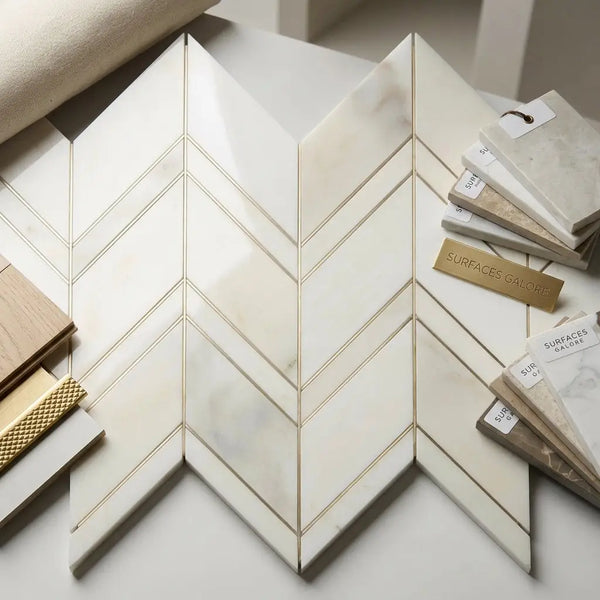 Calacatta verde royale marble chevron mosaic tile polished or honed featuring white marble with subtle veining and gold grout lines