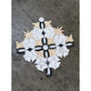 Calacatta Verde Royale marble floral mosaic tile with intricate white black and beige geometric pattern
