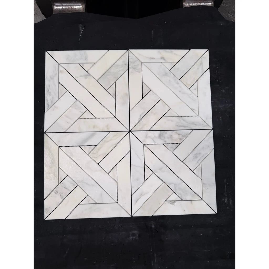 White marble mosaic tile with geometric interwoven pattern in polished honed calacatta verde royale heritage design
