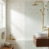 White marble subway tile wall with subtle veining in calacatta verde royale marble mini versailles pattern mosaic tile polished or honed