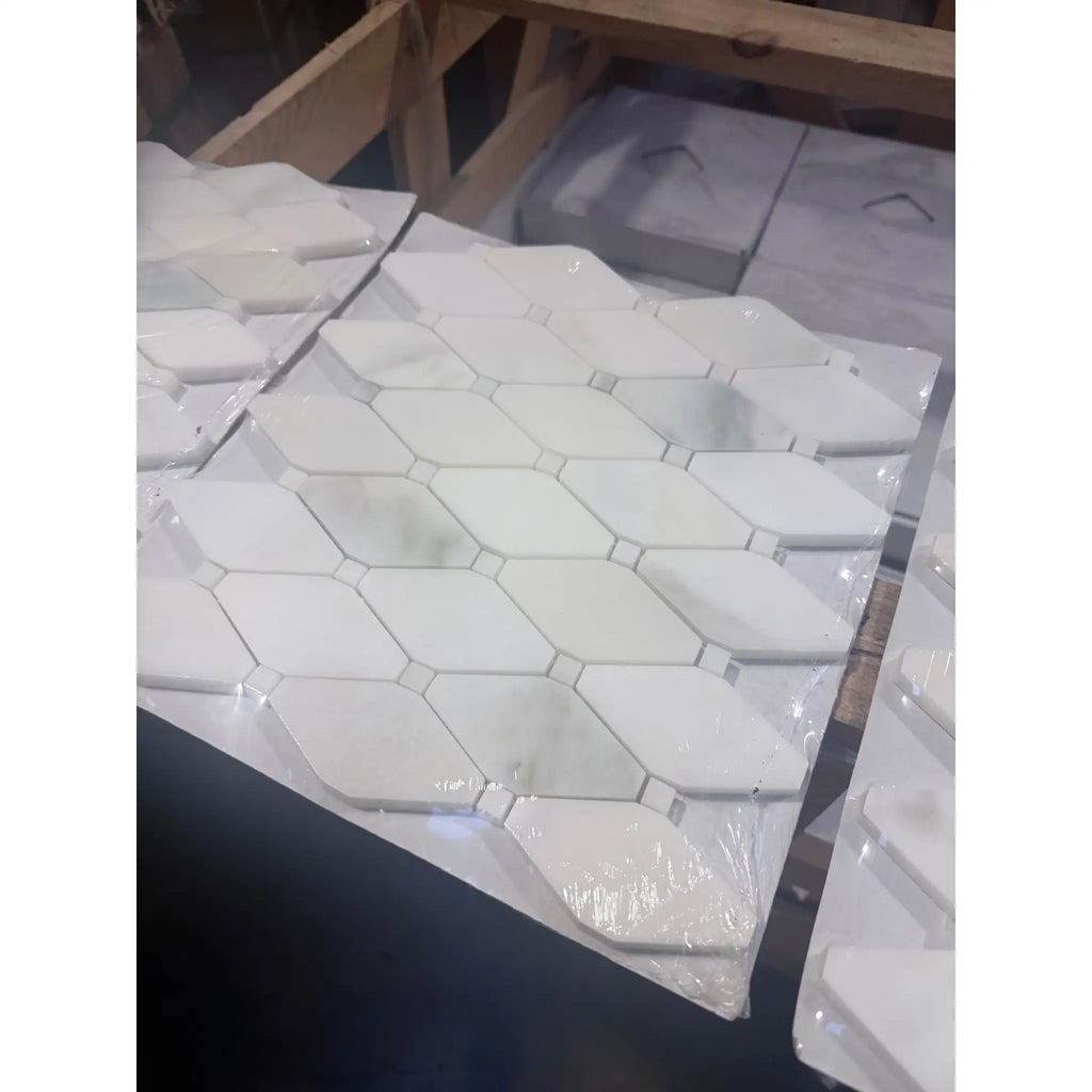 Calacatta Verde Royale polished octagon mosaic tile with glossy white hexagonal metallic accents