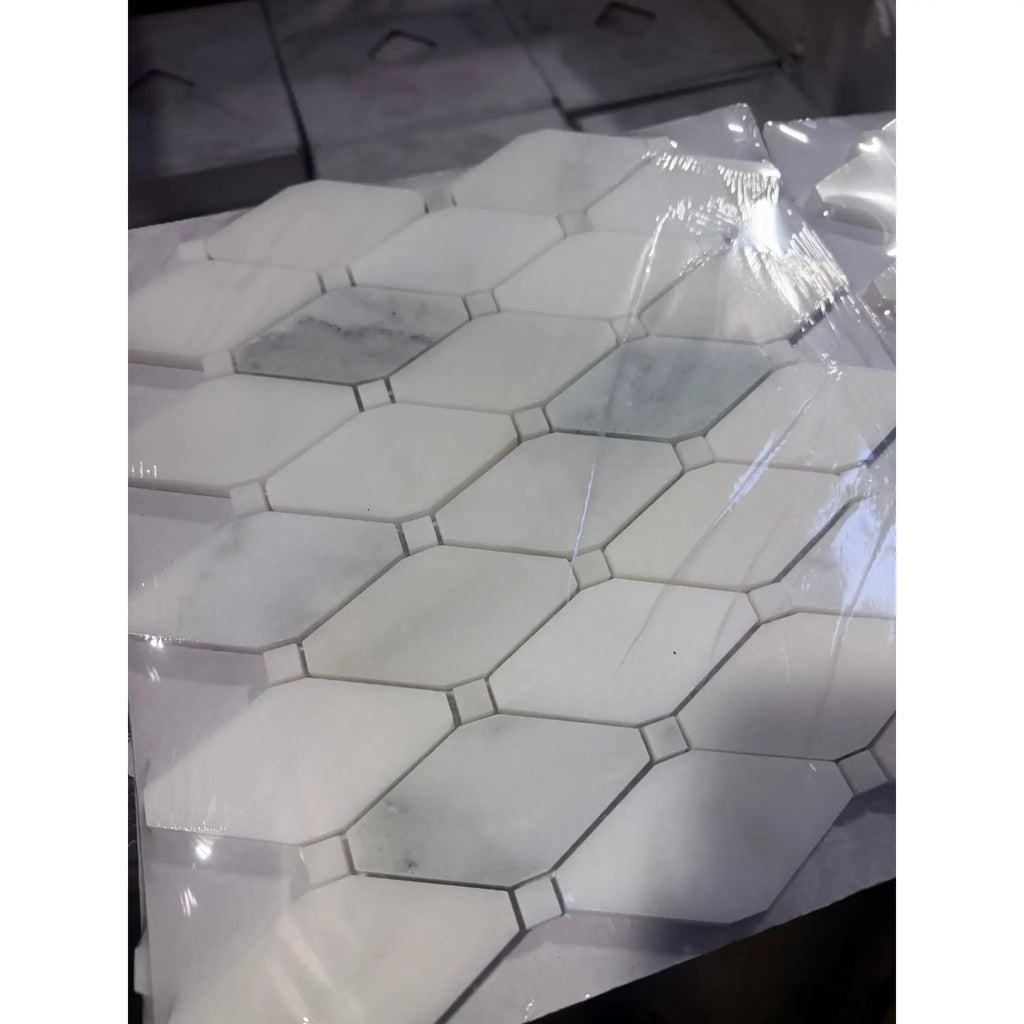 Calacatta Verde Royale polished hexagonal marble tile with black grout