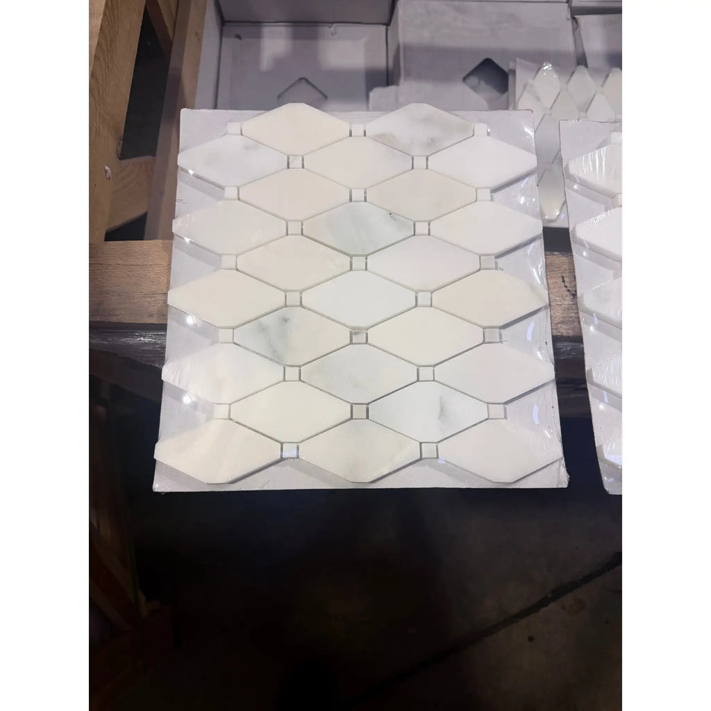 White Calacatta Verde Royale hexagonal mosaic tile with silver accents
