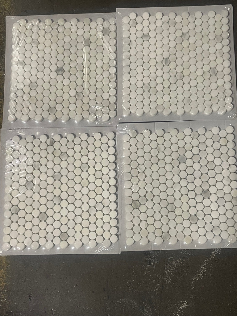 Four sheets of white penny tile mosaics with subtle gray veining for Calacatta Oliva Marble Mosaic