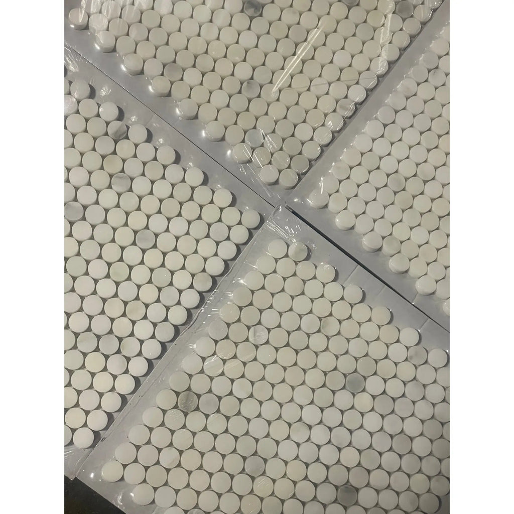 White penny round mosaic tiles packaged in sheets for Calacatta Oliva Marble Mosaic application