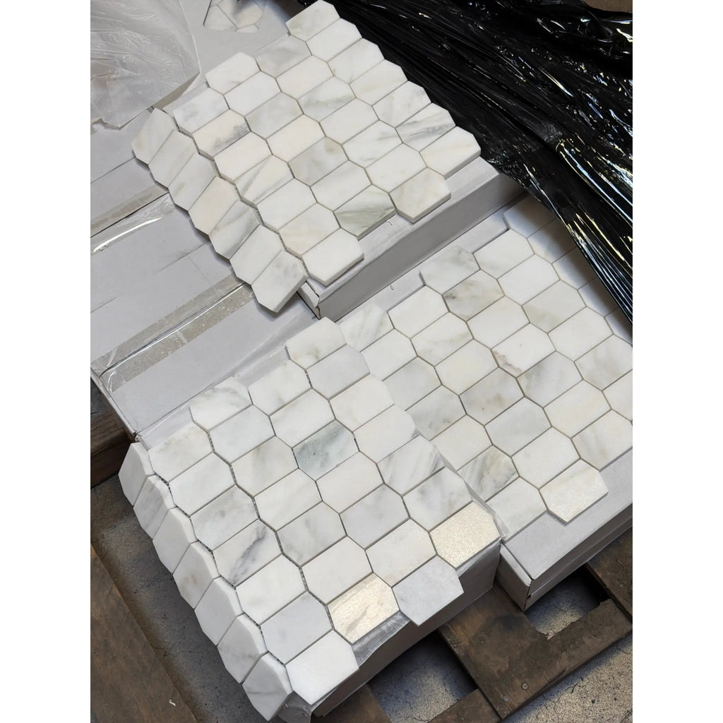 Calacatta Verde Royale white marble picket mosaic tile in staggered pattern