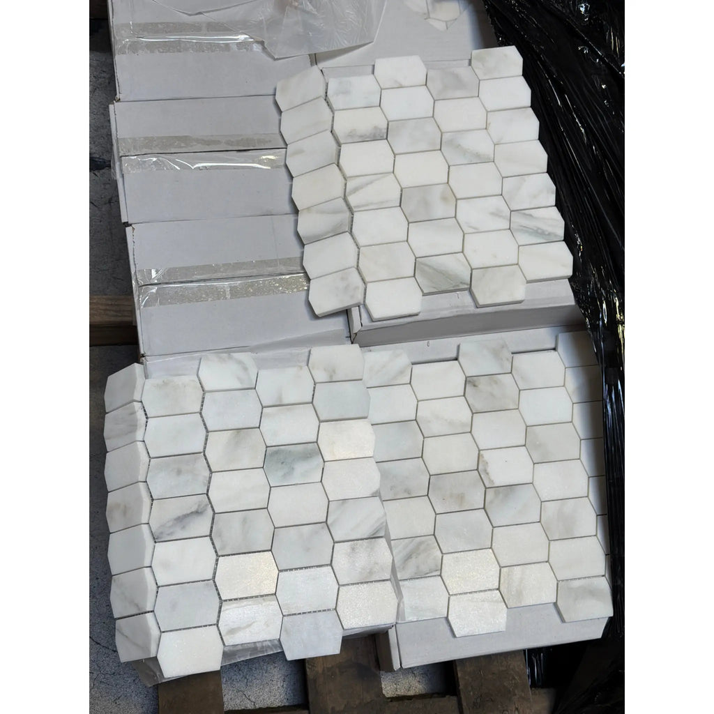 White Calacatta Verde Royale marble picket mosaic tile with gray veining