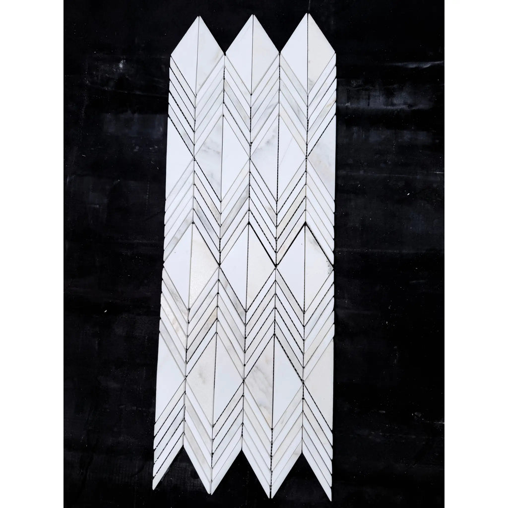 White marble mosaic tile with geometric chevron pattern in calacatta verde royale marble venezia polished-honed finish